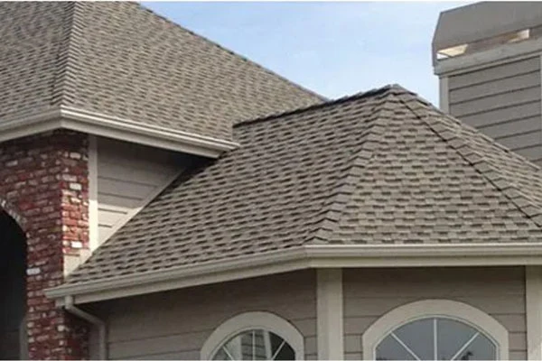 Dimensional asphalt shingles on multiple sloping roof planes
